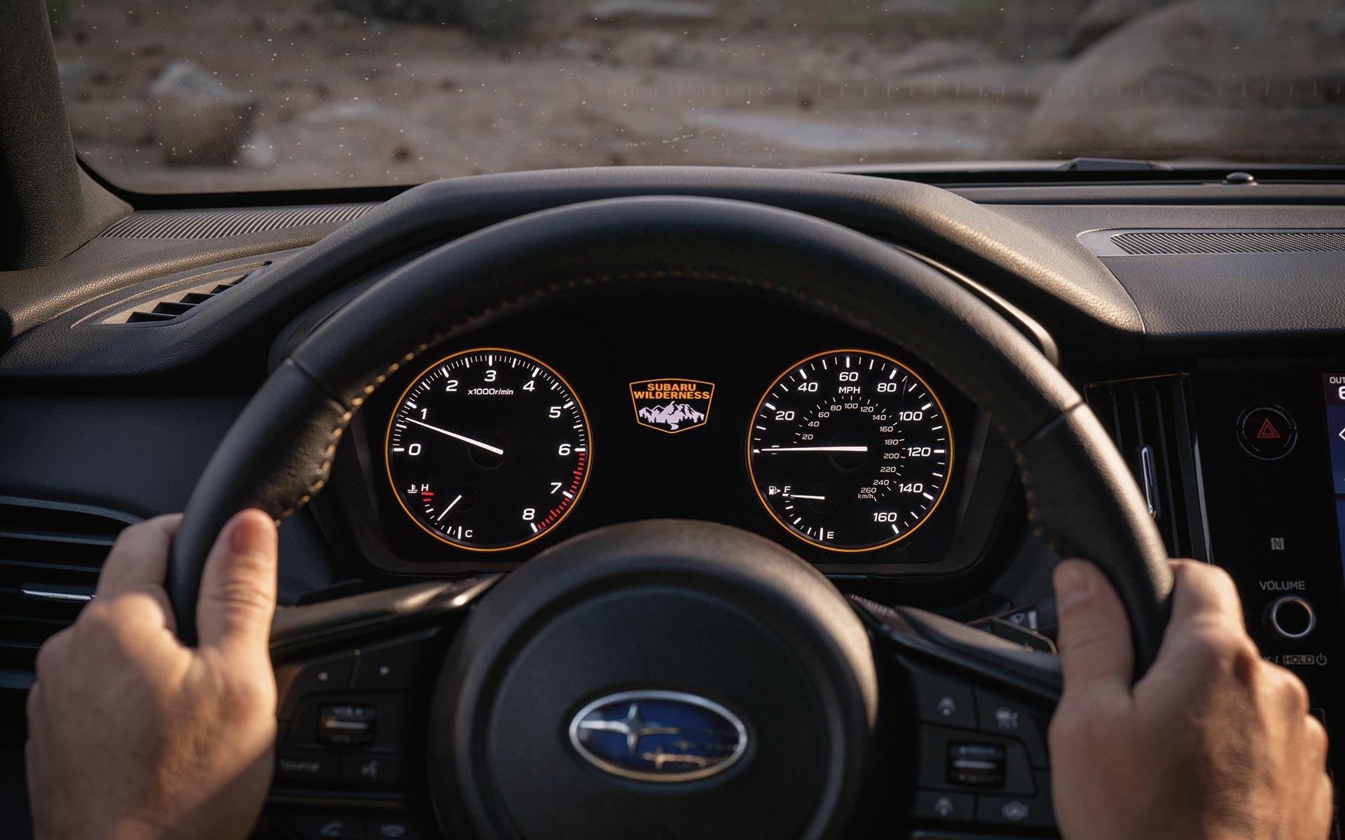 Subaru Outback Wilderness interior steering wheel view.