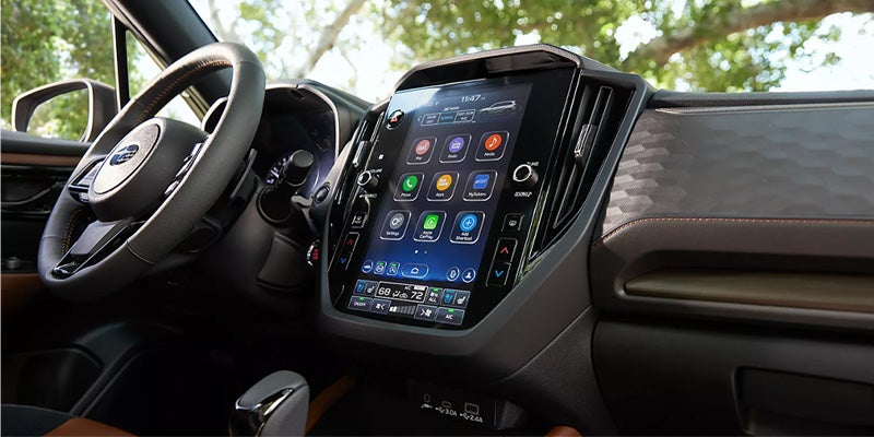 Subaru Forester interior dashboard with touchscreen display.