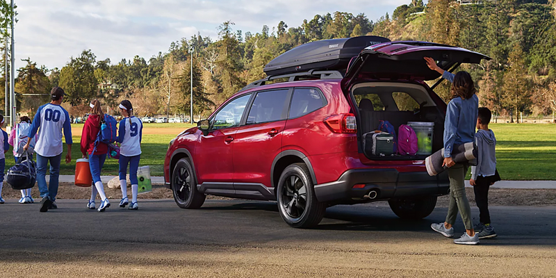2026 red Subaru Ascent being loaded up by family near school activity