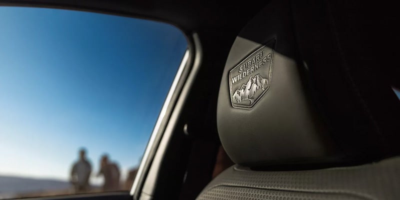 Interior of a 2026 Subaru Crosstrek with the Subaru Wilderness logo on the seat